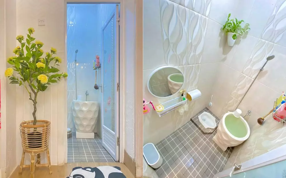 Kamar mandi cerah dengan bak mandi keramik tekstur